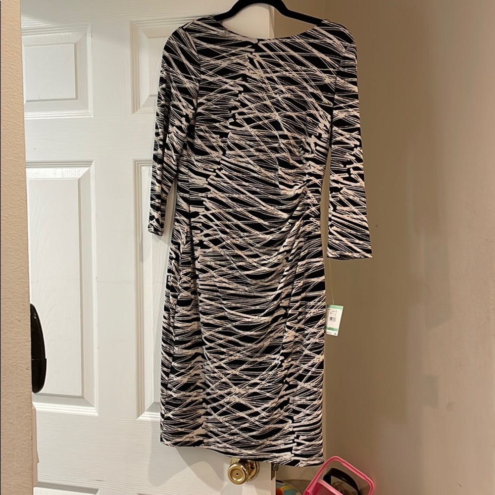 Dress with rouging on the side